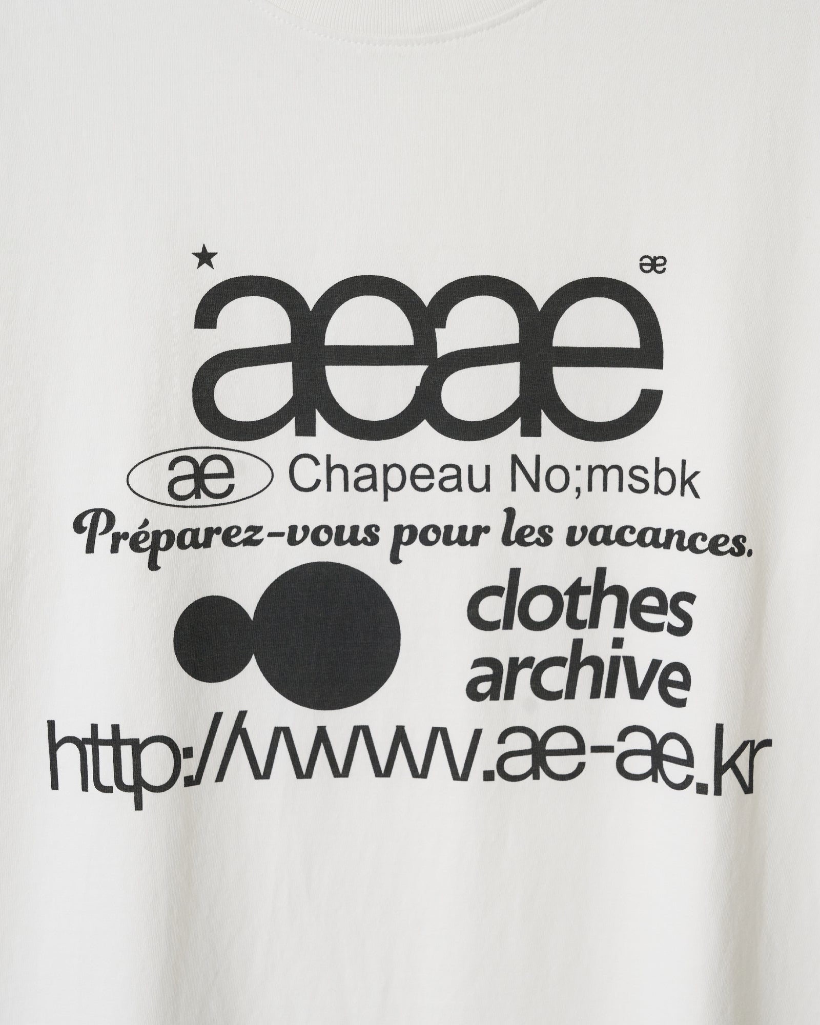 Close up of web logo design print t-shirt from Korean brand aeae, for sale at Shim House