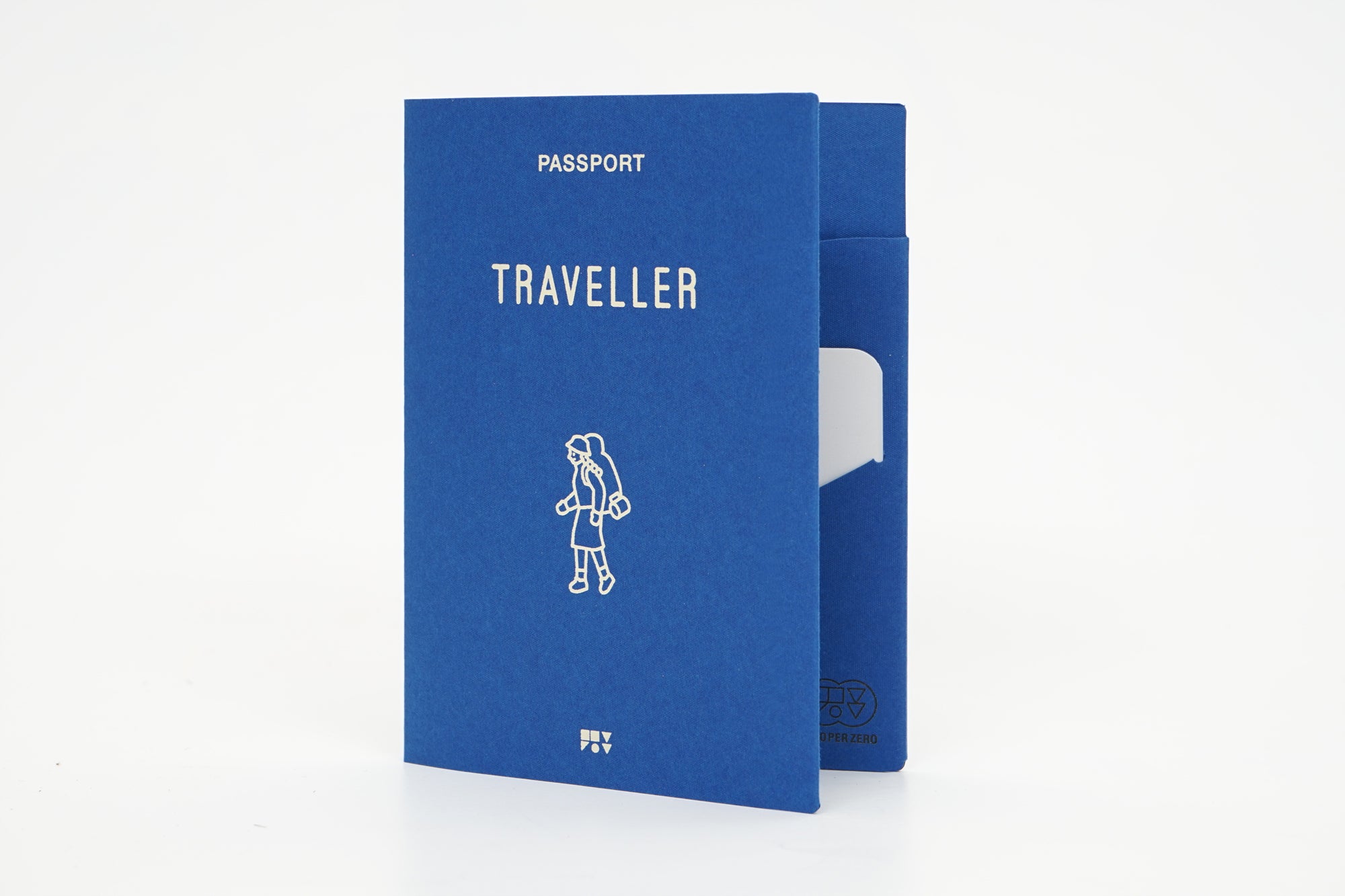 The front of a blue paper passport cover that has a drawing of a traveler on the front, created by Korean brand Zero Per Zero and for sale at Shim House
