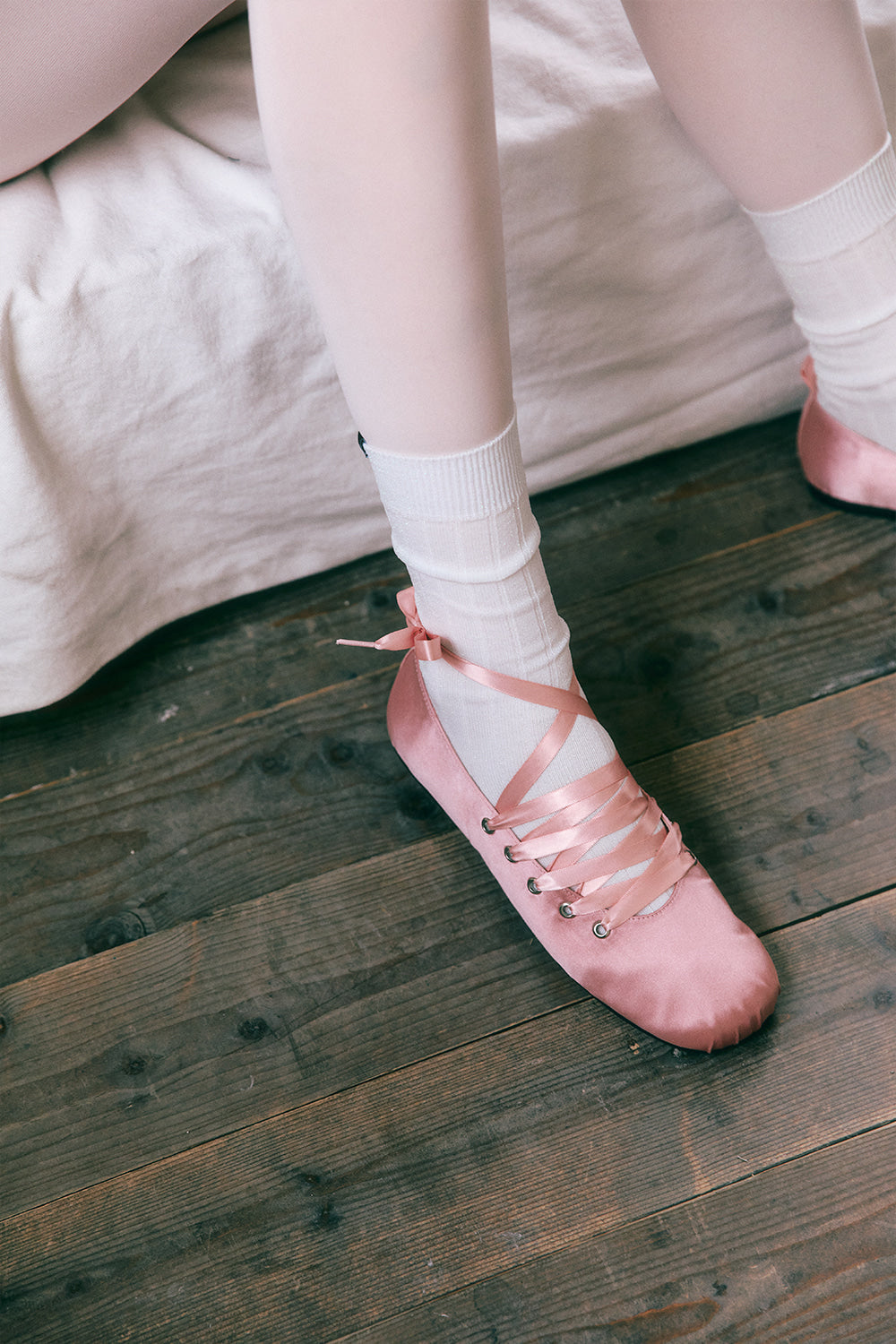 Pink ballerina flats from the Korean brand KHIHO, sold at Shim House