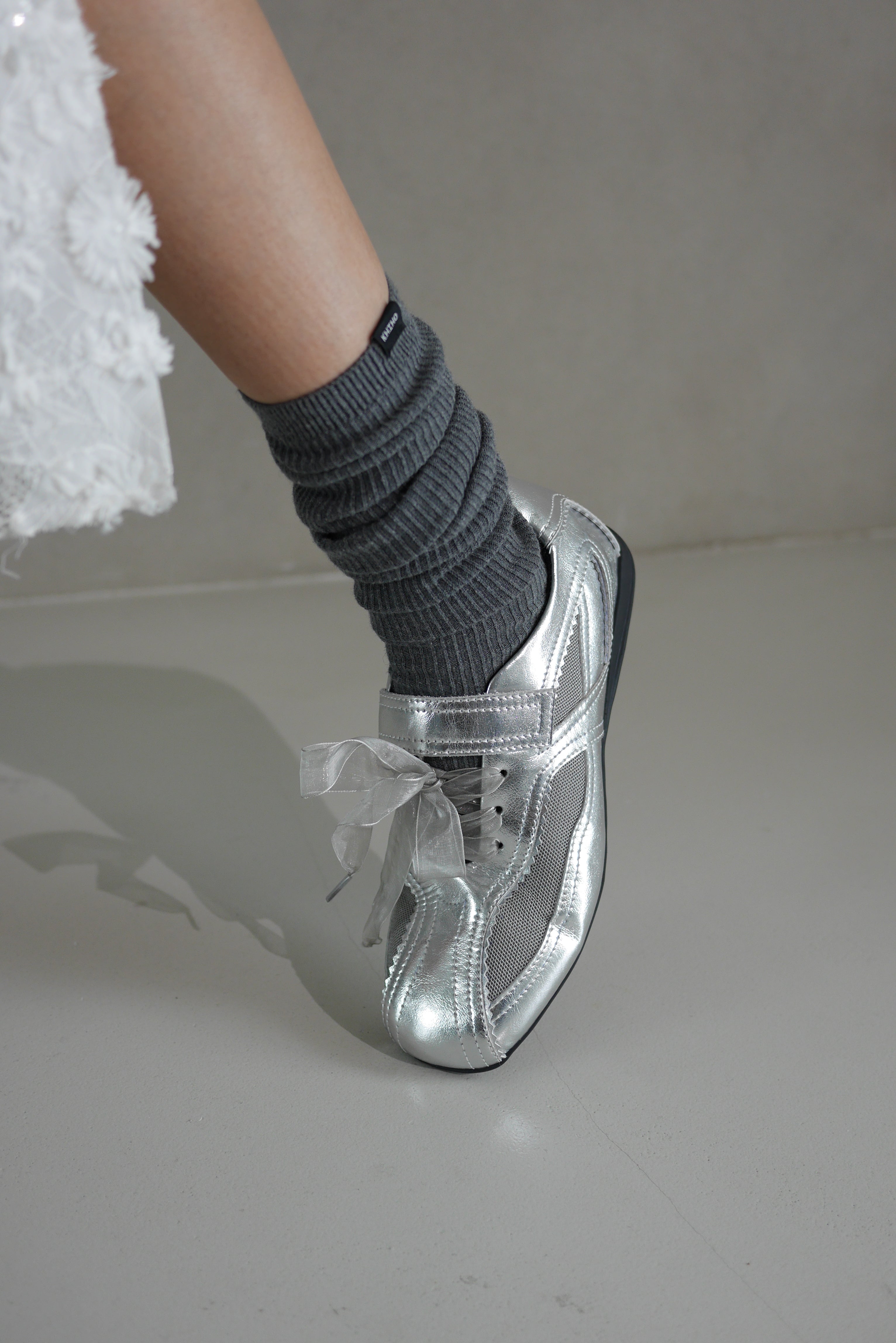 Silver mary jane style sneakers made by Korean brand KHIHO, for sale at Shim House