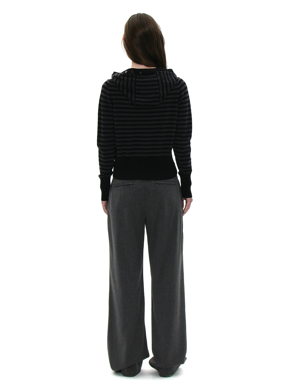 Back view of woman wearing Korean brand PARTIMENTO WOMEN black striped hooded cardigan