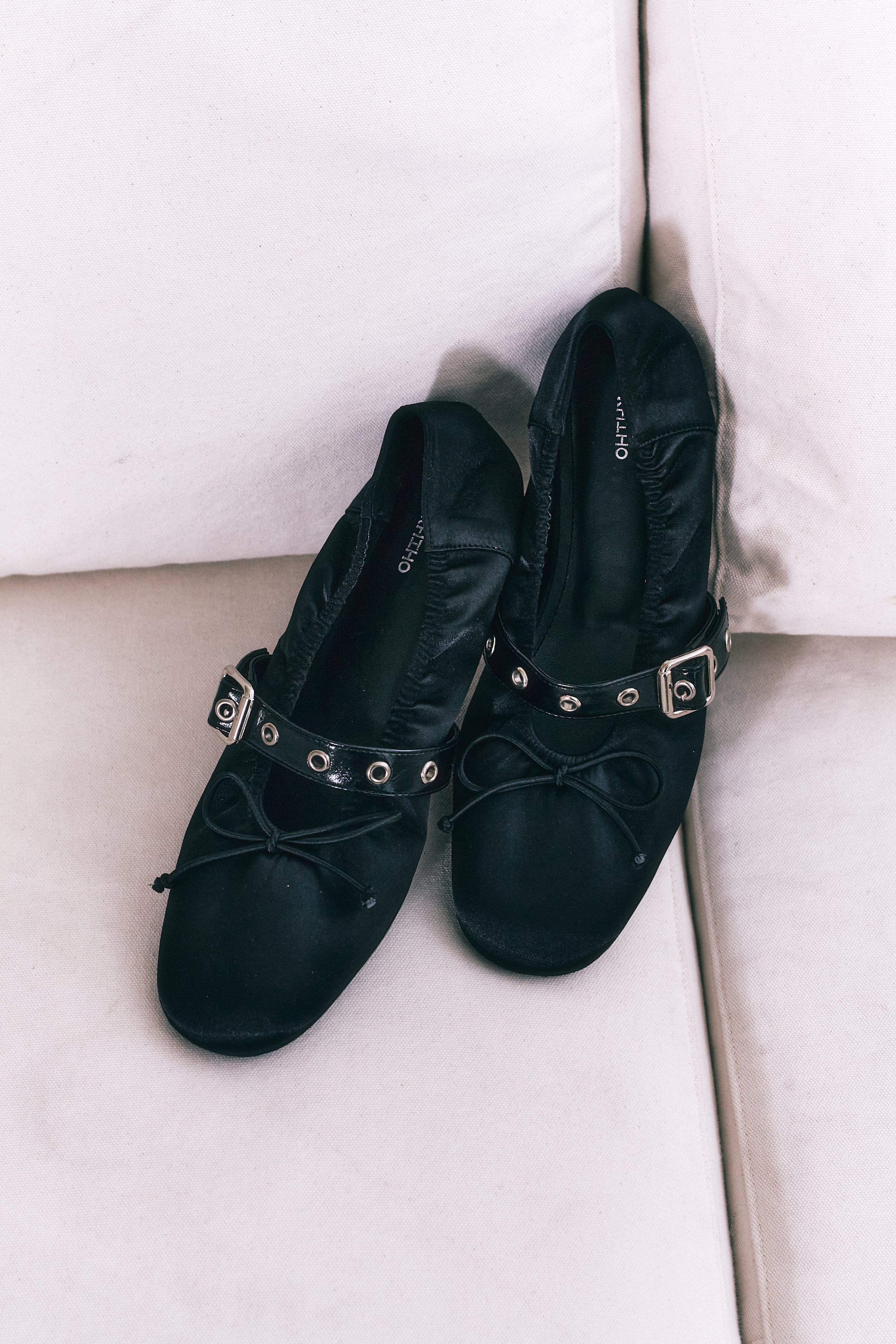 black ballerina flats with a buckle strap from the Korean brand KHIHO, sold at Shim House