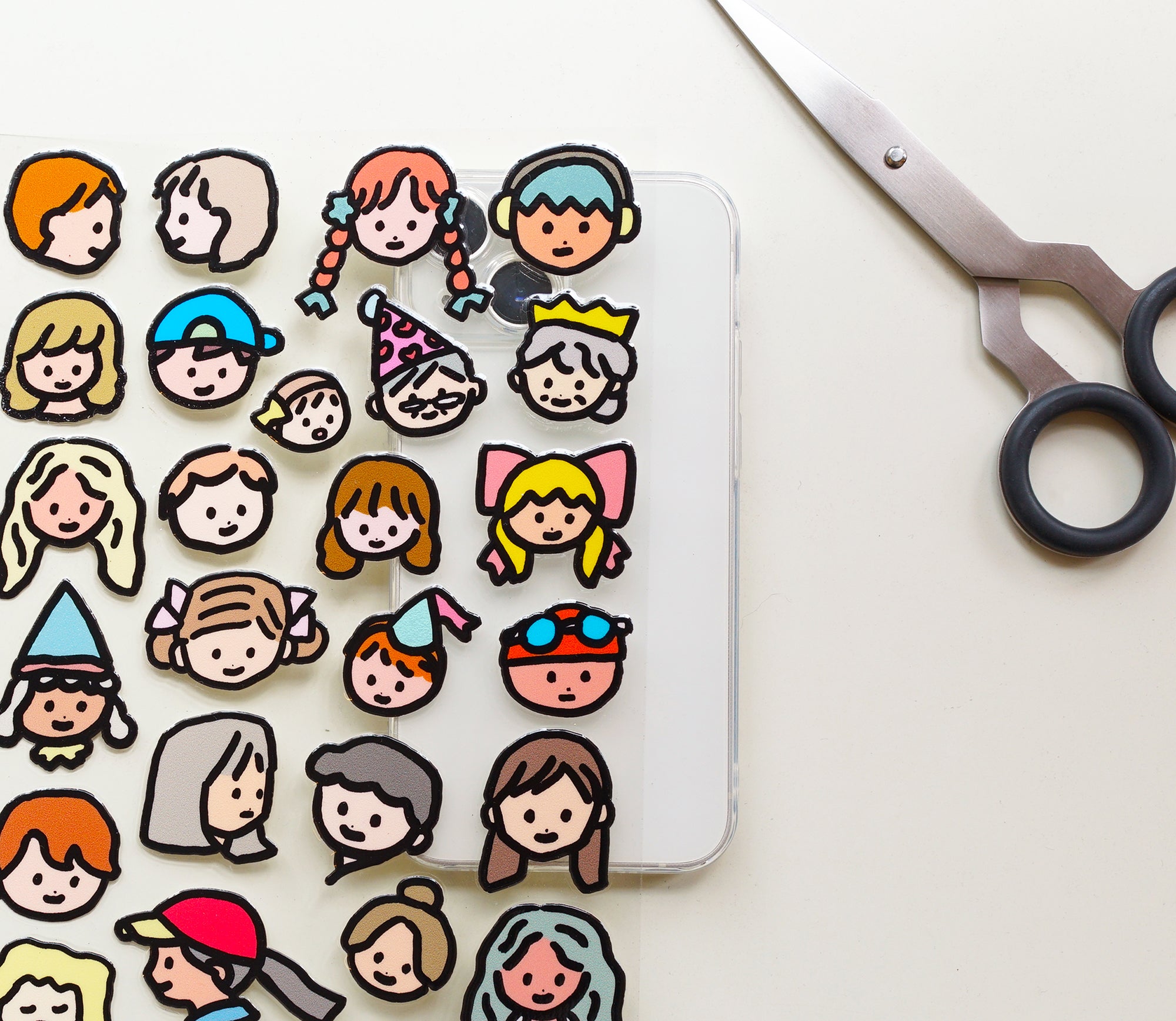 An opened packet of stickers of different drawn faces by Korean brand Zero Per Zero and for sale at Shim House